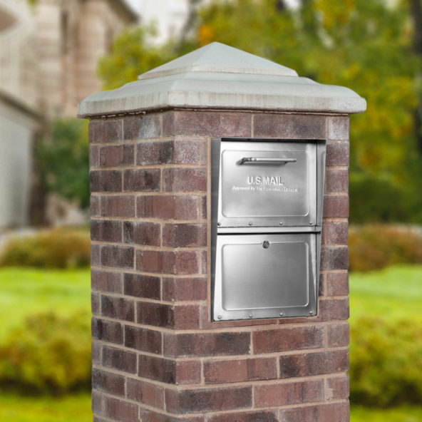 Stainless Steel locking mailbox installed in brick
