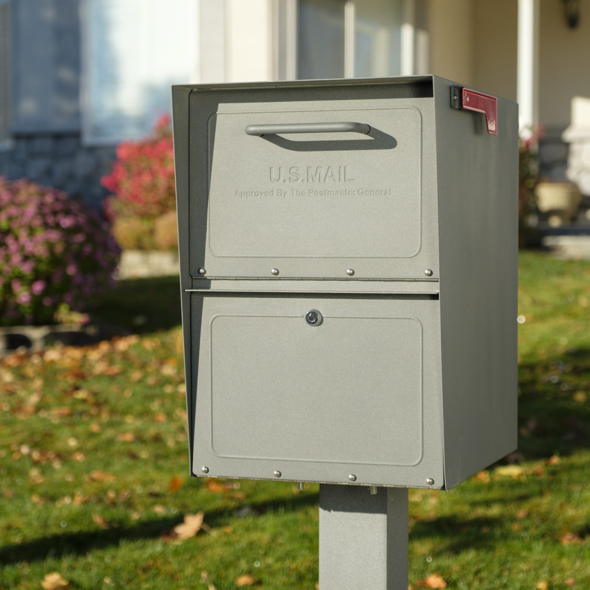 Storm Gray locking mailbox installed with post